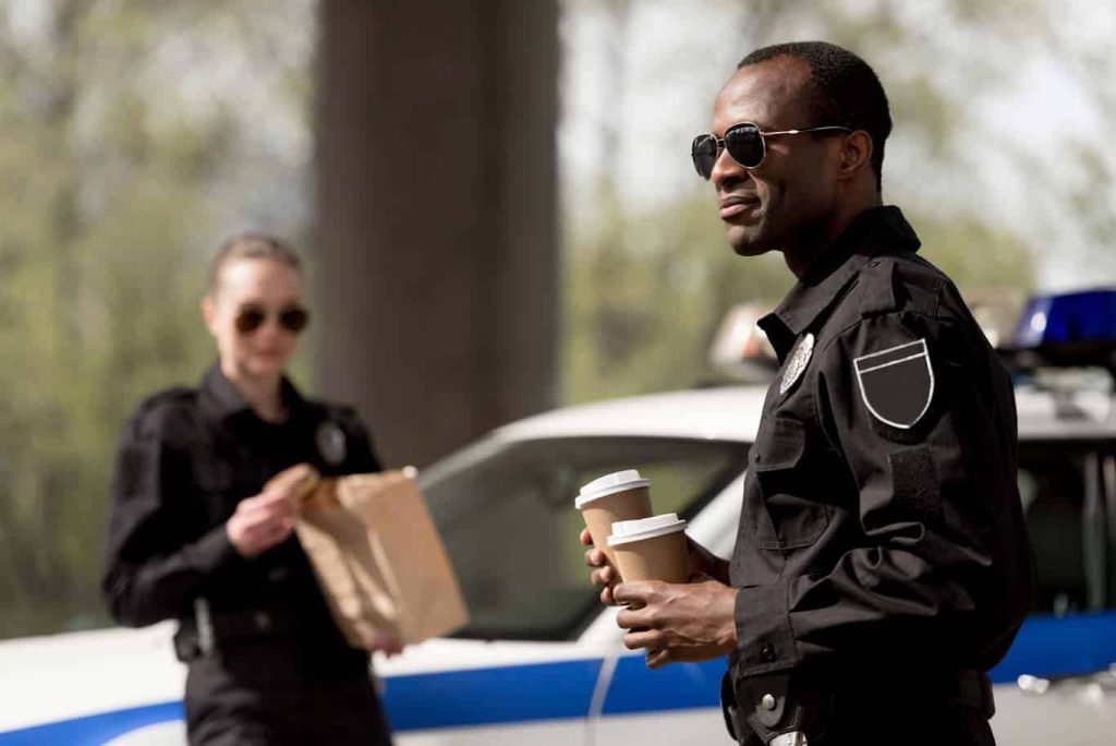 Security officers happily break for lunch, confident that the 1st Reporting app makes their jobs easier, more accountable, and more effective.