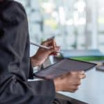 A manager learns how to write an incident report using the 1st Reporting application.
