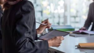 A manager learns how to write an incident report using the 1st Reporting application.