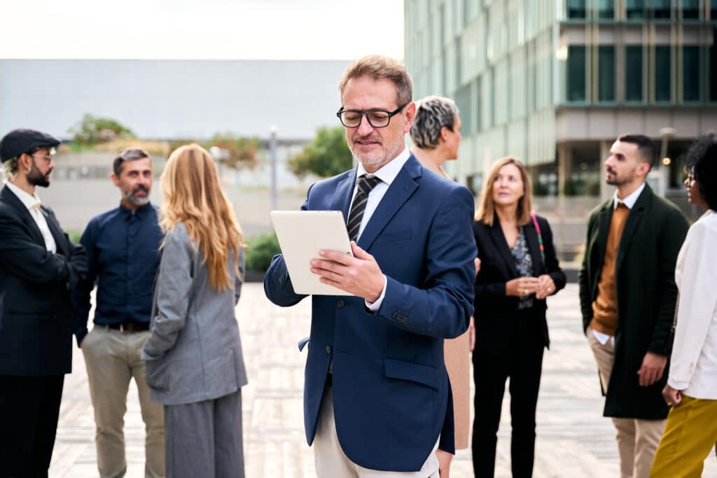 A manager uses a fire drill checklist on a mobile device