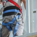 A safety harness on a construction worker