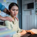 A woman is in need of a workplace harassment incident form.