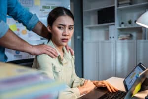A woman is in need of a workplace harassment incident form.