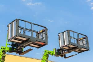 Two aerial boom lifts maintained well using an aerial lift safety checklist.