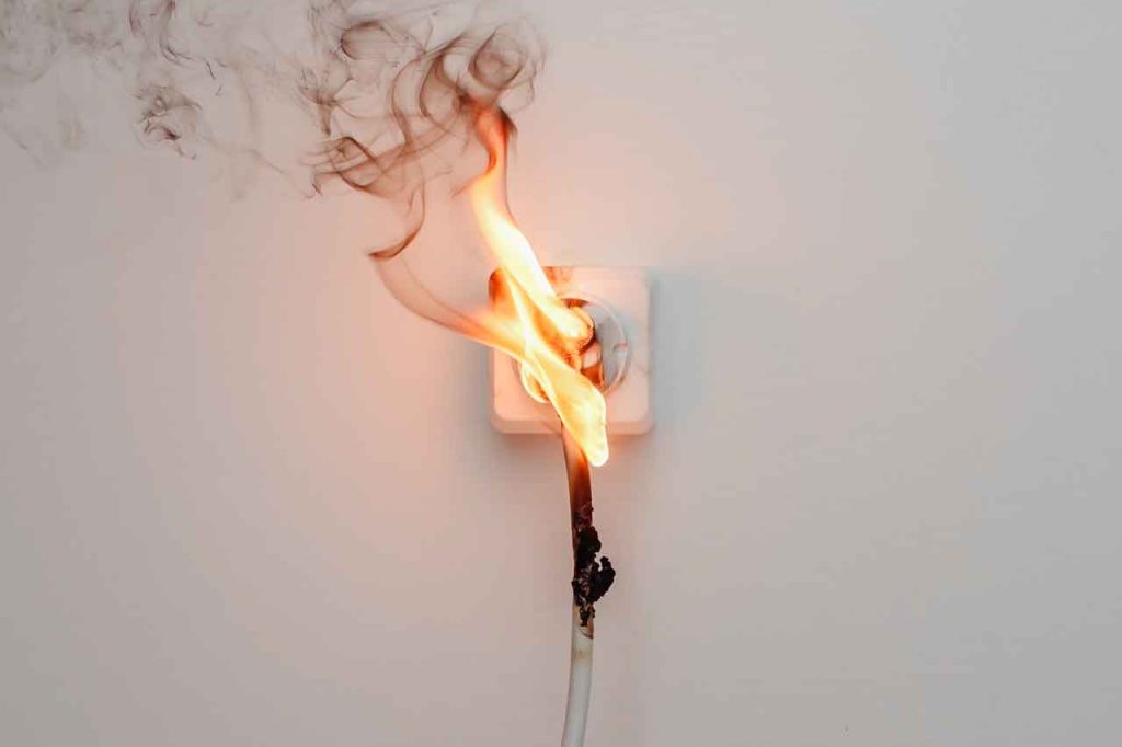 Inadequate circuit grounding can cause a fire, as shown in this file photo. Find out more at 1stReporting.com.
