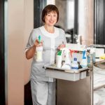 A housekeeping professional demonstrates principles of housekeeping.