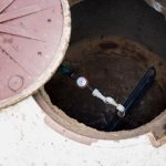 A well sits open, ready for the well inspection checklist (by 1stReporting.com) completion.