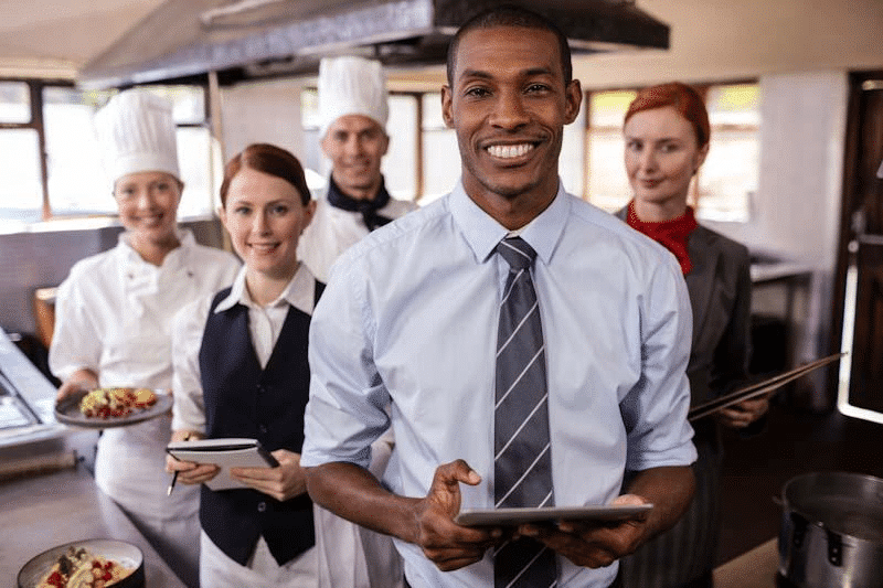Happy hospitality staff are pleased with the new integration of 1st Reporting into their operations. Learn more at 1stReporting.com.