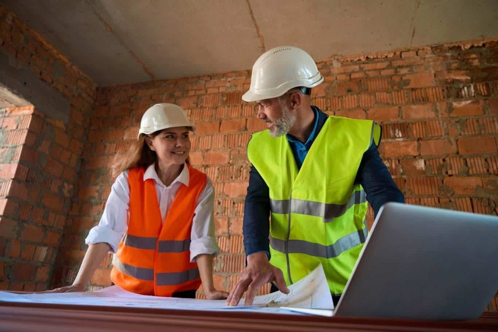 Two construction managers discuss the use of a construction change order form process. Learn more about change order form processes at 1stReporting.com.