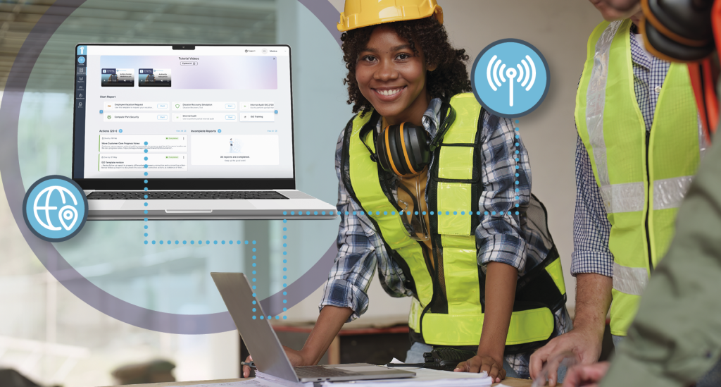 Workers use a construction checklist app for managing compliance reporting in this image. Learn more about compliance reporting in the construction industry at 1stReporting.com.