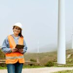 A utilities supervisor uses a tablet for digital reporting.