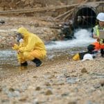 An environmental runoff inspection uses field environmental incident reporting for its utility organization, conducted at an outflow location.
