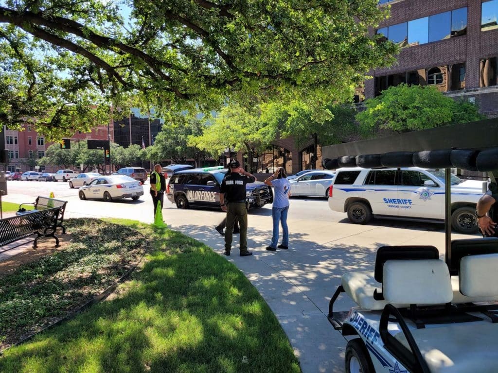 Valor Force security guards reporting in the field during an incident as a part of security operations.